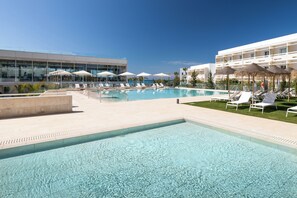 3 outdoor pools, pool umbrellas, sun loungers