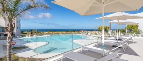 3 outdoor pools, pool umbrellas, sun loungers