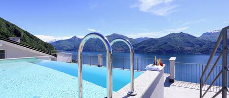 Seasonal outdoor pool, pool loungers