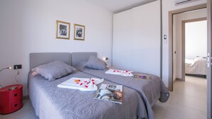 Familie resortwoning, meerdere slaapkamers, 2 badkamers, uitzicht op gebergte (Villetta Arisia) | 3 slaapkamers, een strijkplank/strijkijzer, gratis wifi