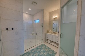 Combined shower/tub, hair dryer, towels, soap
