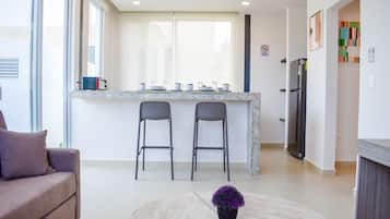 Classic Apartment | Living area | Flat-screen TV