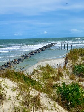 On the beach, sun-loungers, beach towels