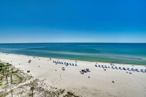 On the beach, sun loungers