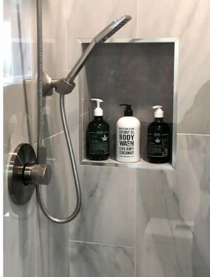 Shower, hair dryer, towels, soap