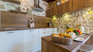 Villa | Private kitchen | Fridge, microwave, oven, stovetop