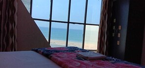 Chambre Deluxe | Draps en coton égyptien, literie de qualité, ameublement unique