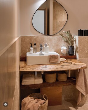 Shower, eco-friendly toiletries, hair dryer, towels