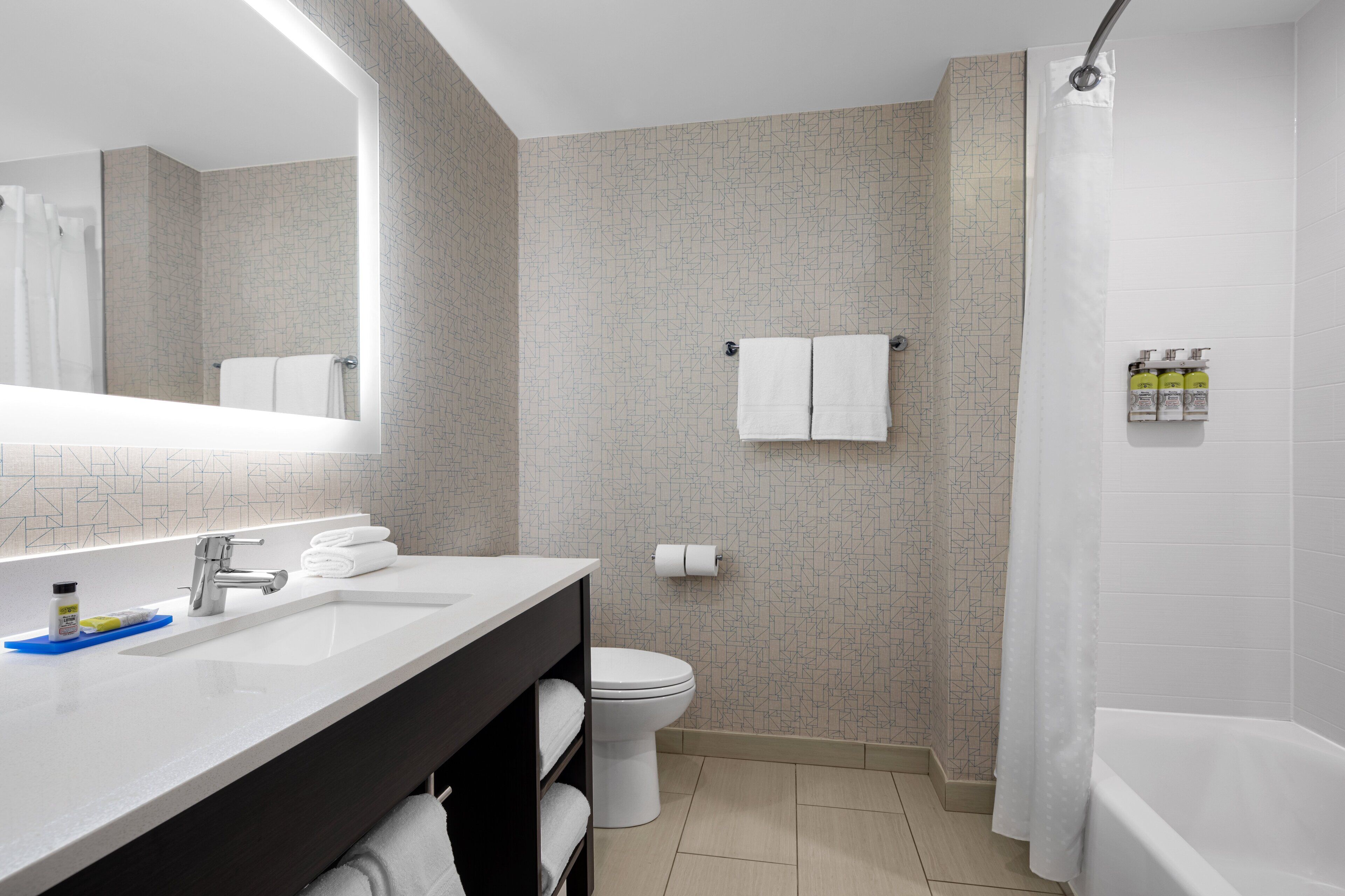 separate bathtub and shower, free toiletries, hair dryer, slippers