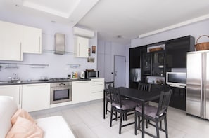 Apartment, 1 Bedroom | Private kitchen | Full-sized fridge, oven, stovetop, cookware/dishes/utensils - Gorgeous and Peaceful Apartment near metro stop (Milan)