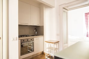 Apartment, 1 Bedroom | Living area | Flat-screen TV
