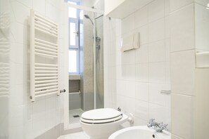 Apartment, 1 Bedroom | Bathroom | Shower, rainfall showerhead, free toiletries, hair dryer - White and Clean Apartment near Metro MM1 (Milan)