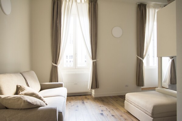 Appartement, 1 chambre | Coin séjour