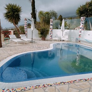 Outdoor pool, a heated pool - Villa with spectacular sea views, heated saltwater pool, dreamlike garden  (Tijarafe)