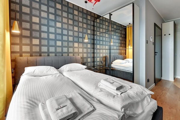 1 bedroom, premium bedding, blackout drapes, iron/ironing board