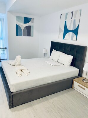 2 habitaciones, tabla de planchar con plancha y wifi gratis 