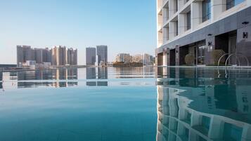 Indoor pool, outdoor pool, open 7:00 AM to 10:30 PM, pool loungers