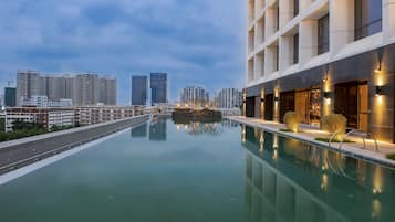 Indoor pool, outdoor pool, open 7:00 AM to 10:30 PM, sun loungers