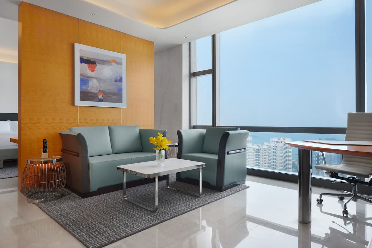 1 habitación, cubrecamas, minibar y caja de seguridad en la habitación