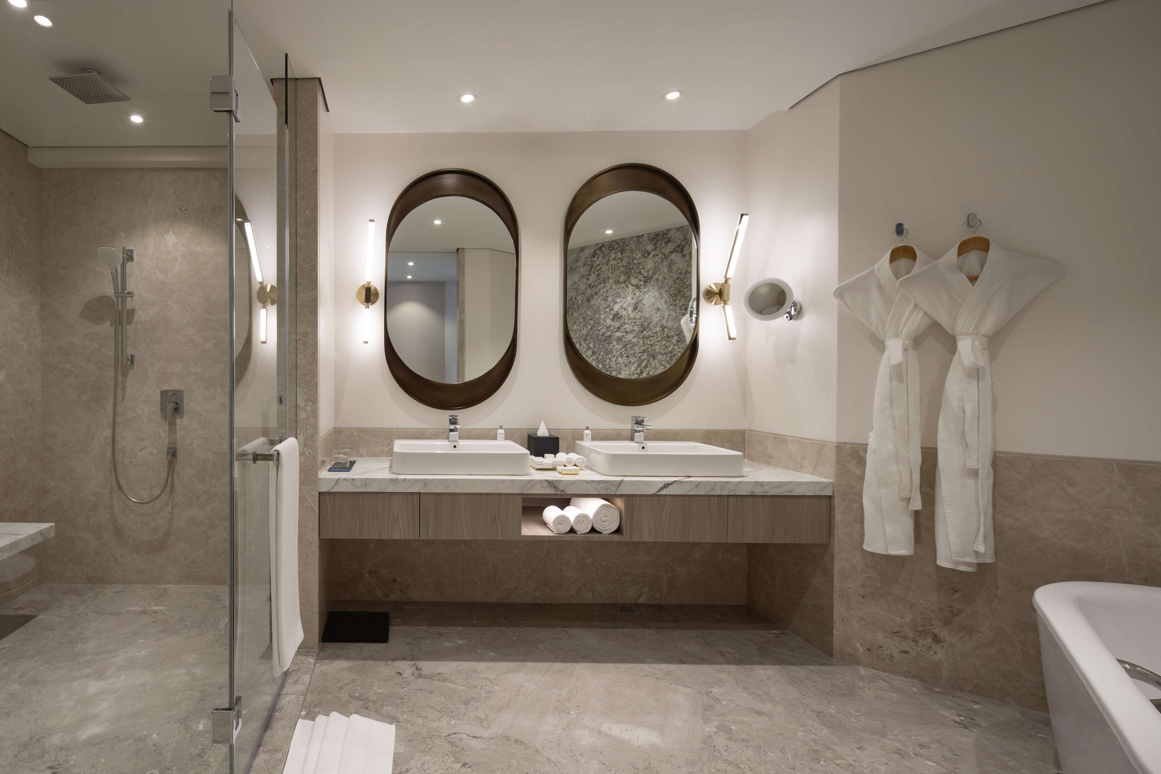 suite (city light) | bathroom | eco-friendly toiletries, hair dryer, bathrobes, slippers