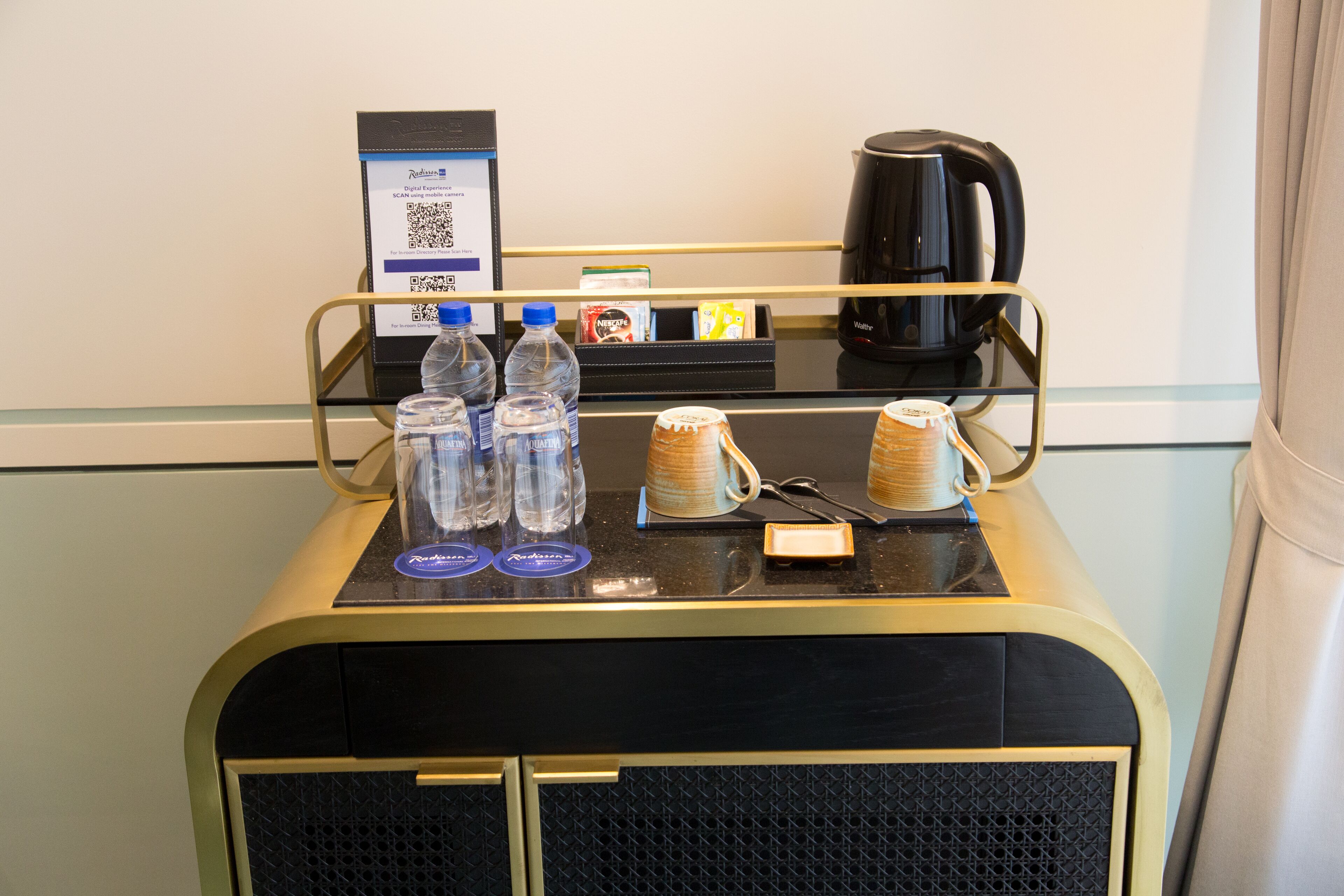 deluxe room | minibar, in-room safe, individually furnished, desk