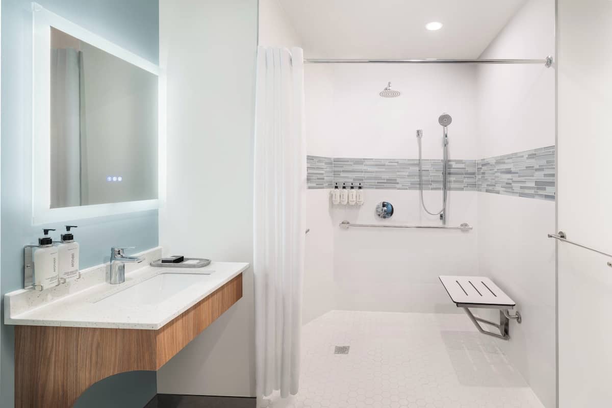 Shower, eco-friendly toiletries, hair dryer, towels