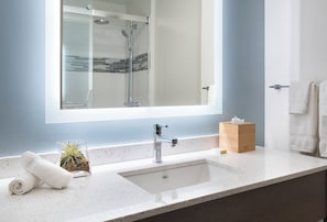 Shower, eco-friendly toiletries, hair dryer, towels