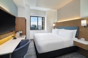 Premium bedding, memory-foam beds, in-room safe, laptop workspace