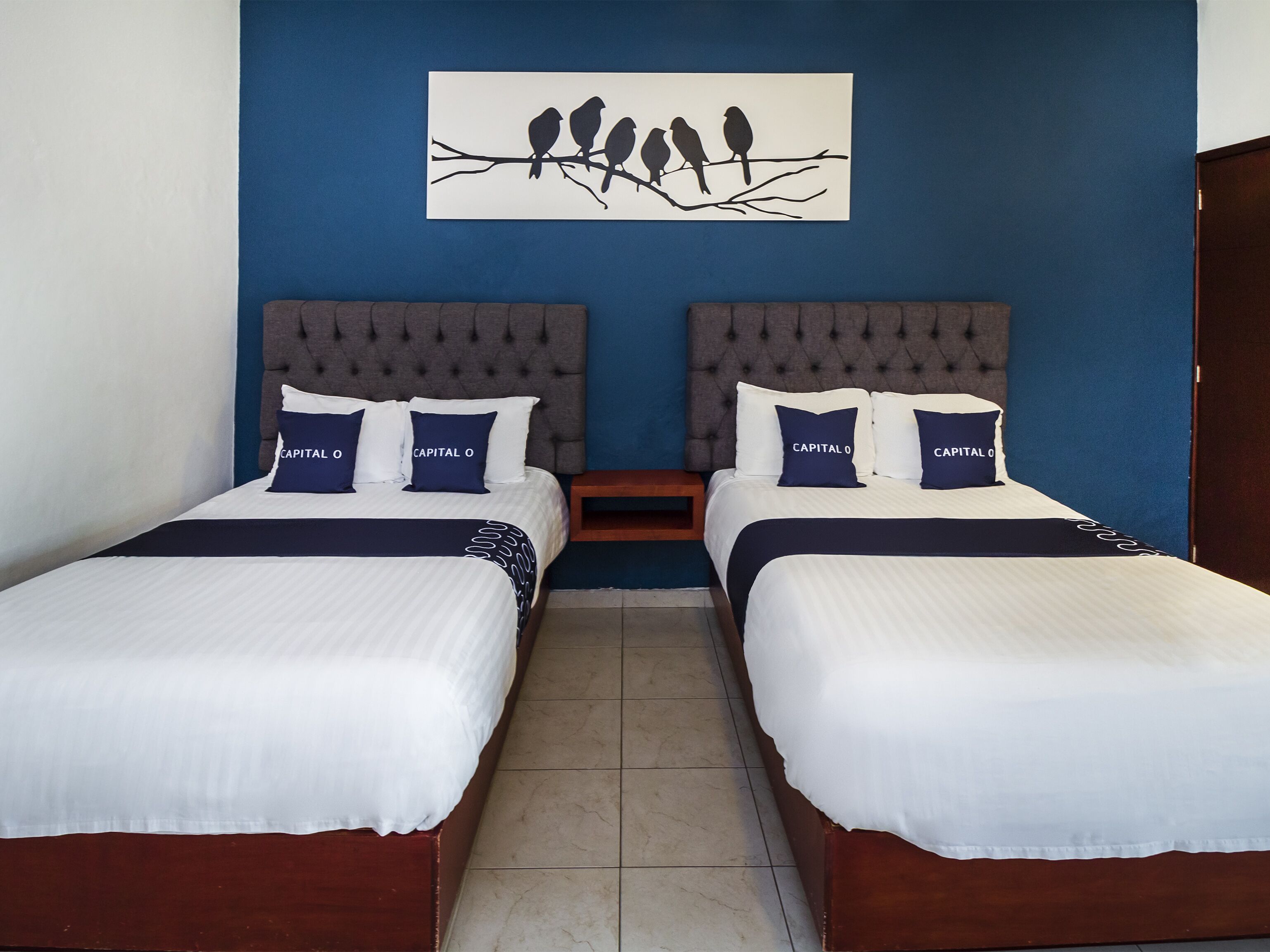 standard room, 2 queen beds | minibar, desk, iron/ironing board, free wifi