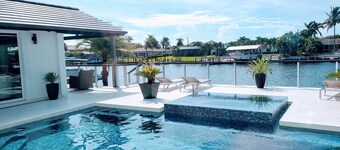 Custom Home with tile pool, boating dock and every comfort  