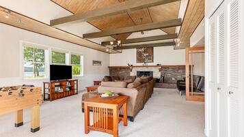 Smart TV, DVD player, foosball, video library