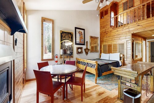 Eclectic second floor condo w/ loft, balcony, & gas fireplace - family friendly