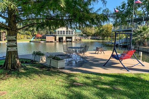Charming dog-friendly lakefront home with lake view, dock, & washer/dryer