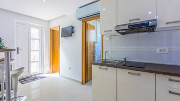 Villa | Private kitchen | Fridge, oven, stovetop, dishwasher