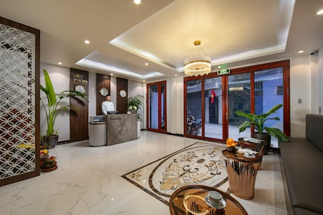 Lobby sitting area. P-Link Home & Hotel