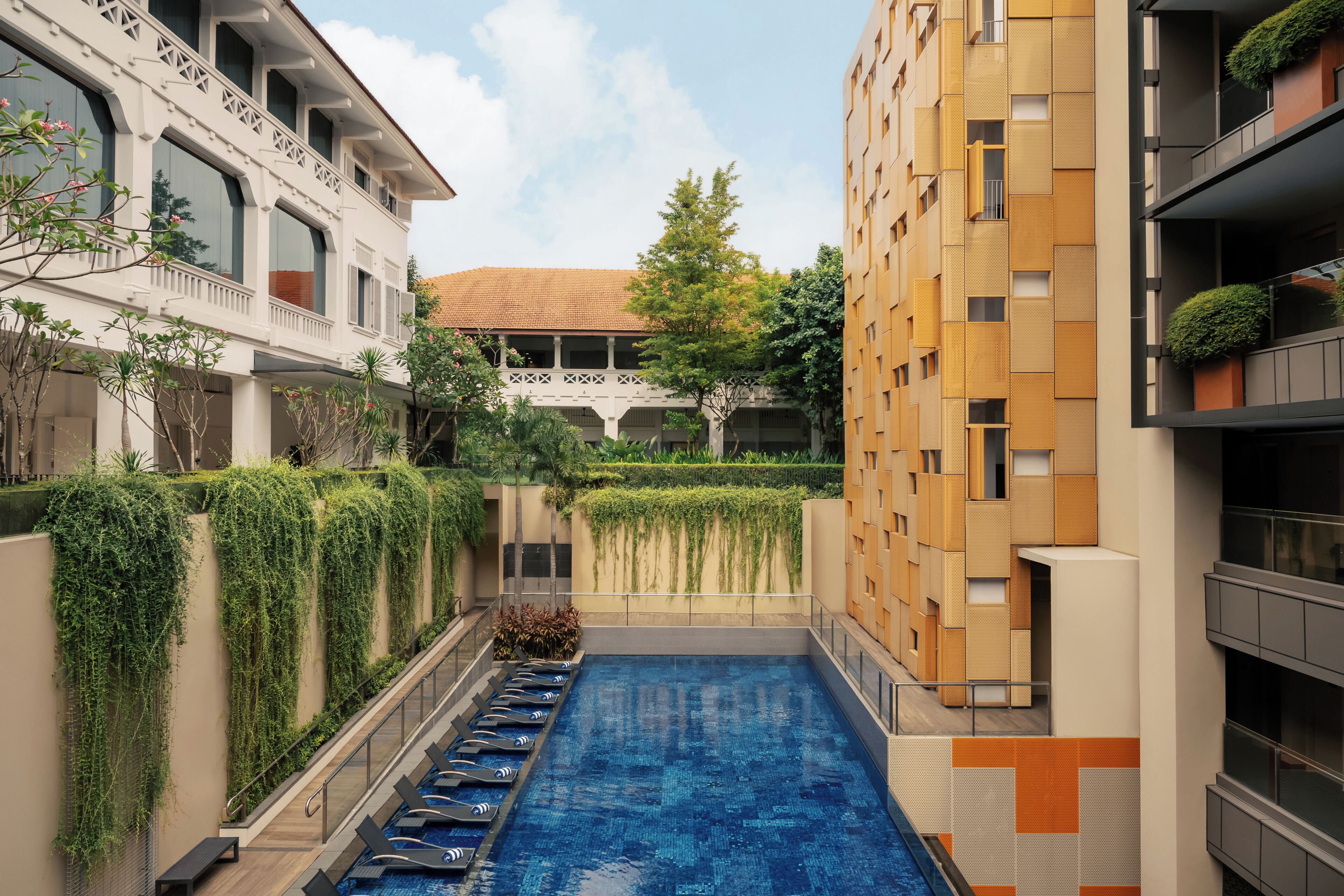 Outdoor pool, open 7:00 AM to 10:00 PM, sun loungers