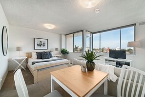 Studio Apartment | Living area | 40-inch Smart TV with cable channels, TV - Bright And Sunny Studio Apartment (Neutral Bay)