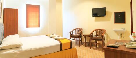 Quarto luxo | Escrivaninha, Wi-Fi de cortesia, roupa de cama