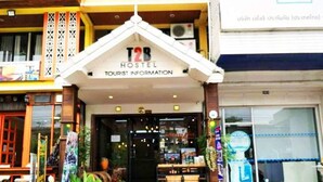 A hostel with a signboard for tourist information. - T2B Home - Hostel (Chiang Mai)