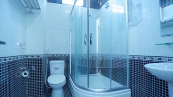 Shower, free toiletries, slippers, bidet