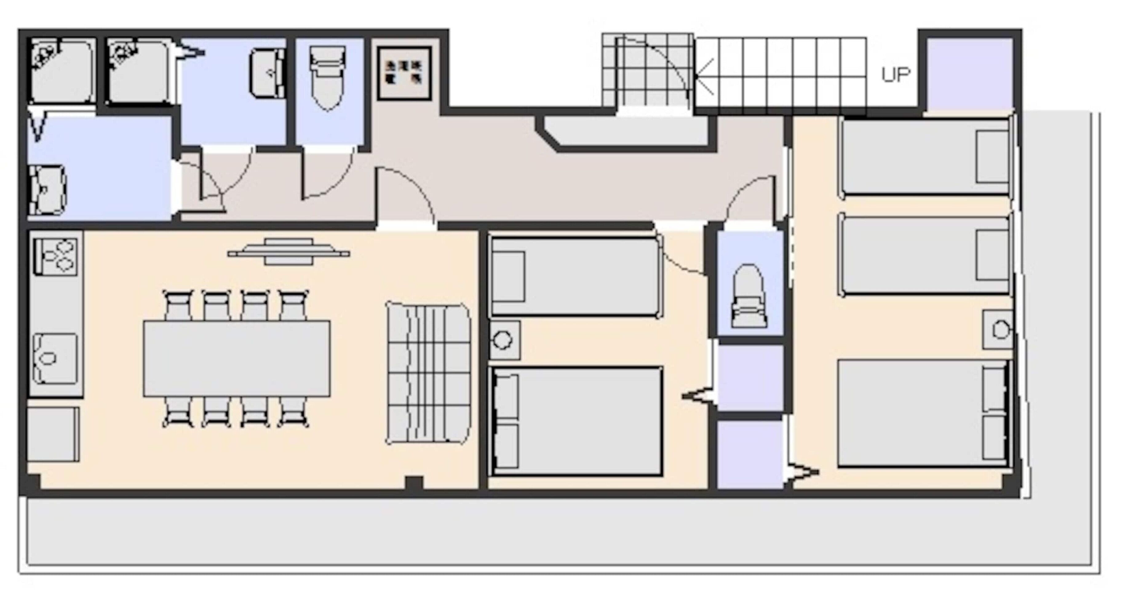 Un hôtel comprenant un espace repas, plusieurs chambres, une salle de bain et une buanderie.