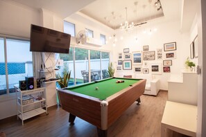 Basic Townhome | Living room | 50-inch Smart TV with cable channels, TV, Netflix