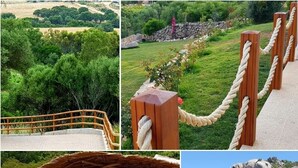 A wooden deck with a rope barrier, a stone wall, a rustic wooden structure, and a large rock formation. - Petra manna summer Palau Sardinia  (PALAU)