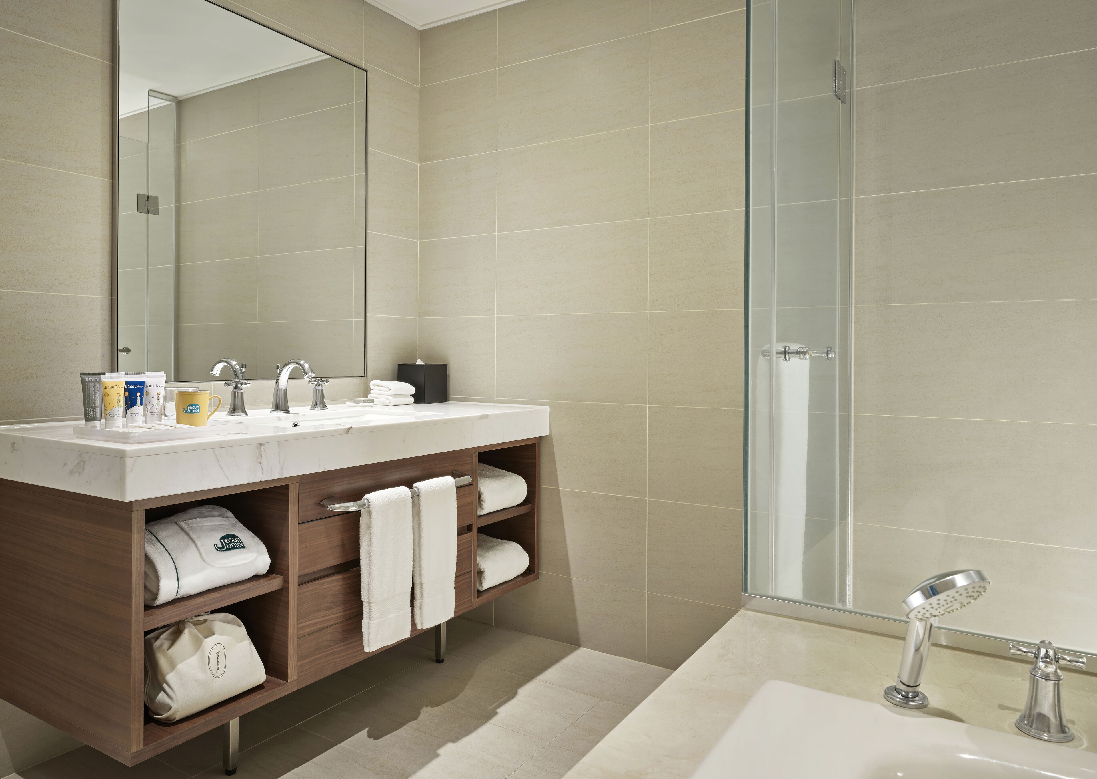 combined shower/bathtub, free toiletries, hair dryer, bathrobes