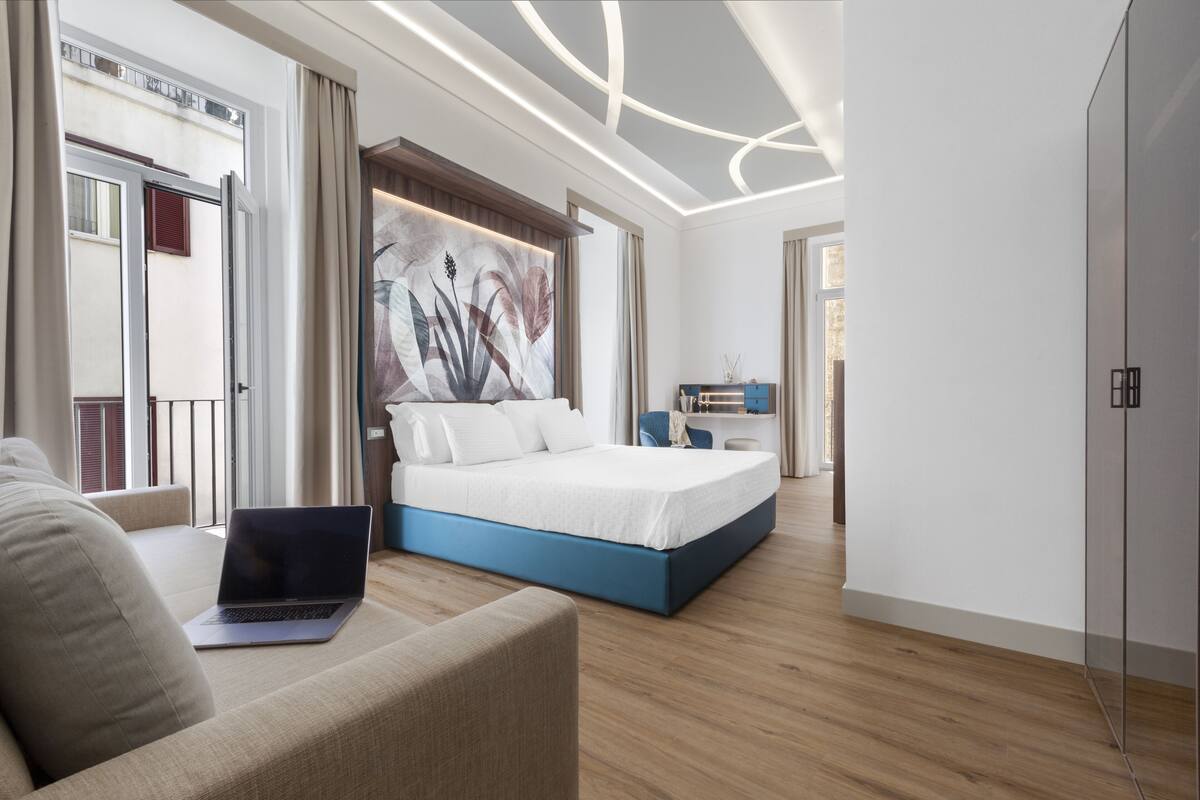 Superior Room | Minibar (free items), in-room safe, desk, laptop workspace