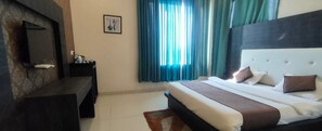 Individually furnished, desk, laptop workspace, iron/ironing board