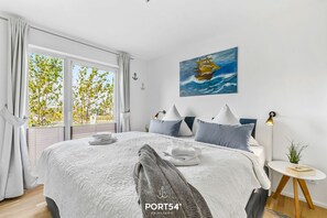 2 habitaciones, tabla de planchar con plancha y cuna de viaje 