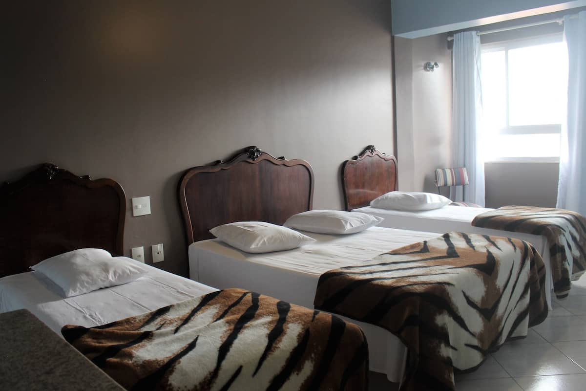 Economy-Vierbettzimmer, 1 Schlafzimmer | Kostenloses WLAN, Bettwäsche