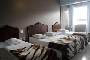 Economy Quadruple Room, 1 Bedroom | Free WiFi, bed sheets