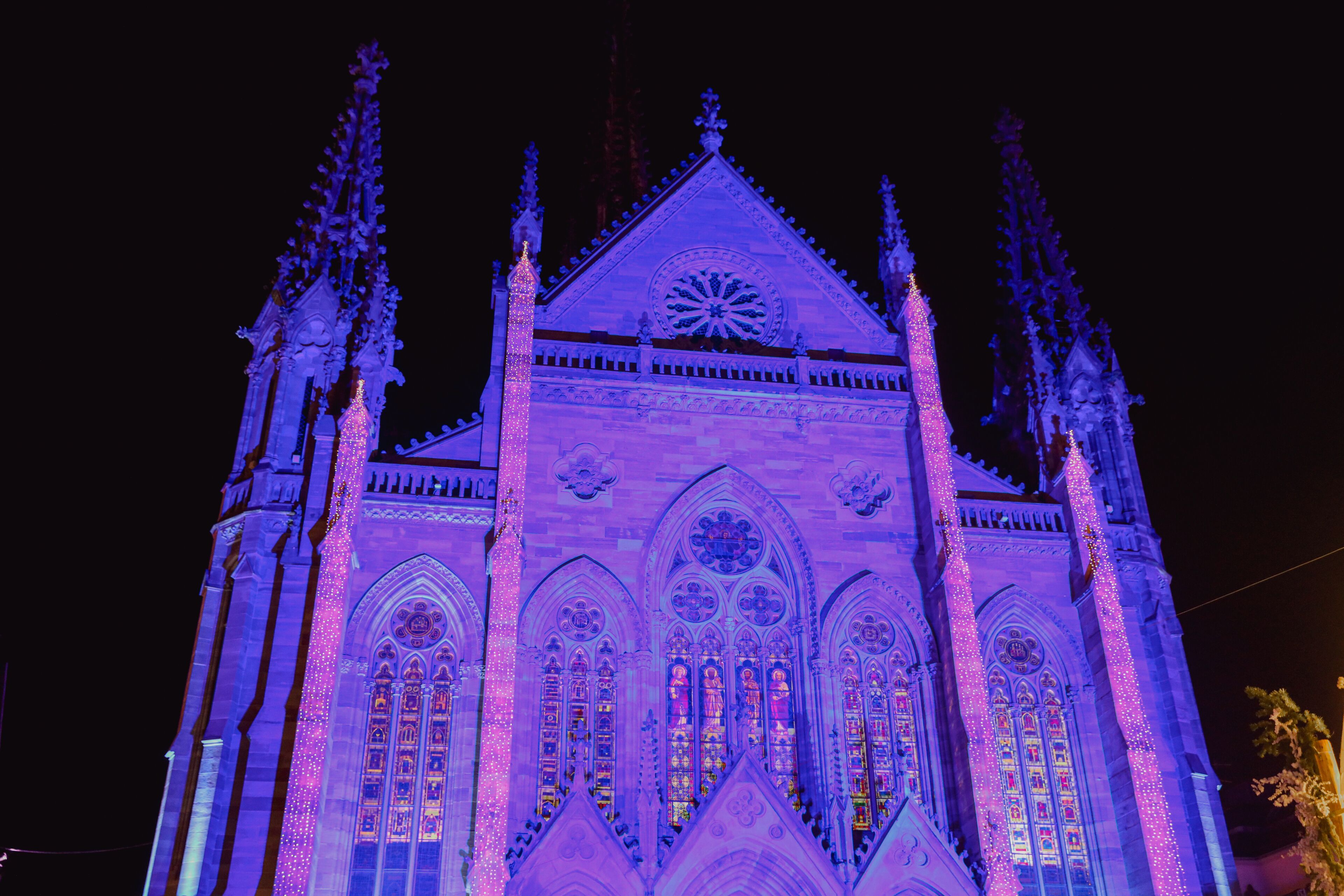 A Gothic-style building with pointed arches and a large rose window.